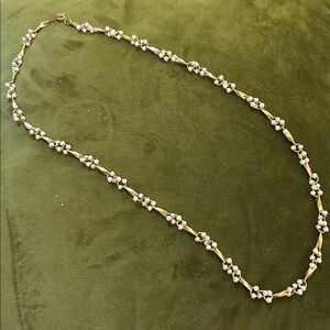 Elegant Gold and White Beaded Necklace